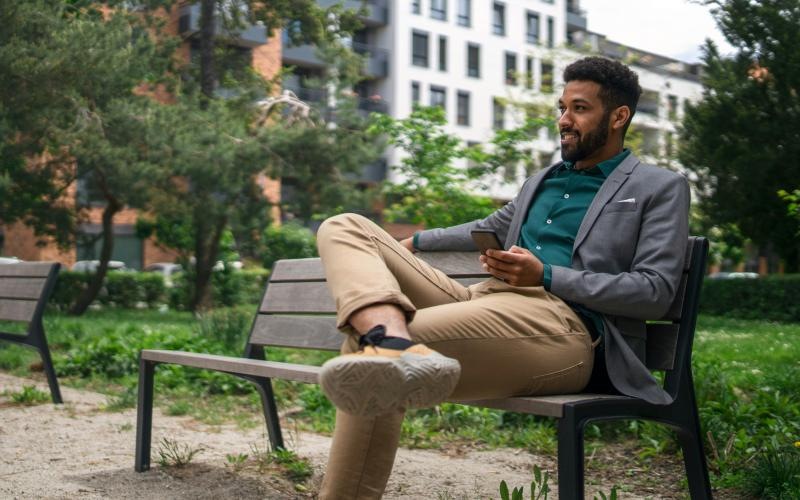a man sitting on a bench