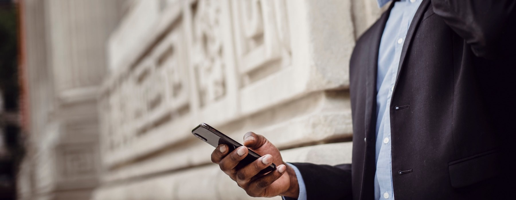 a man holding a phone
