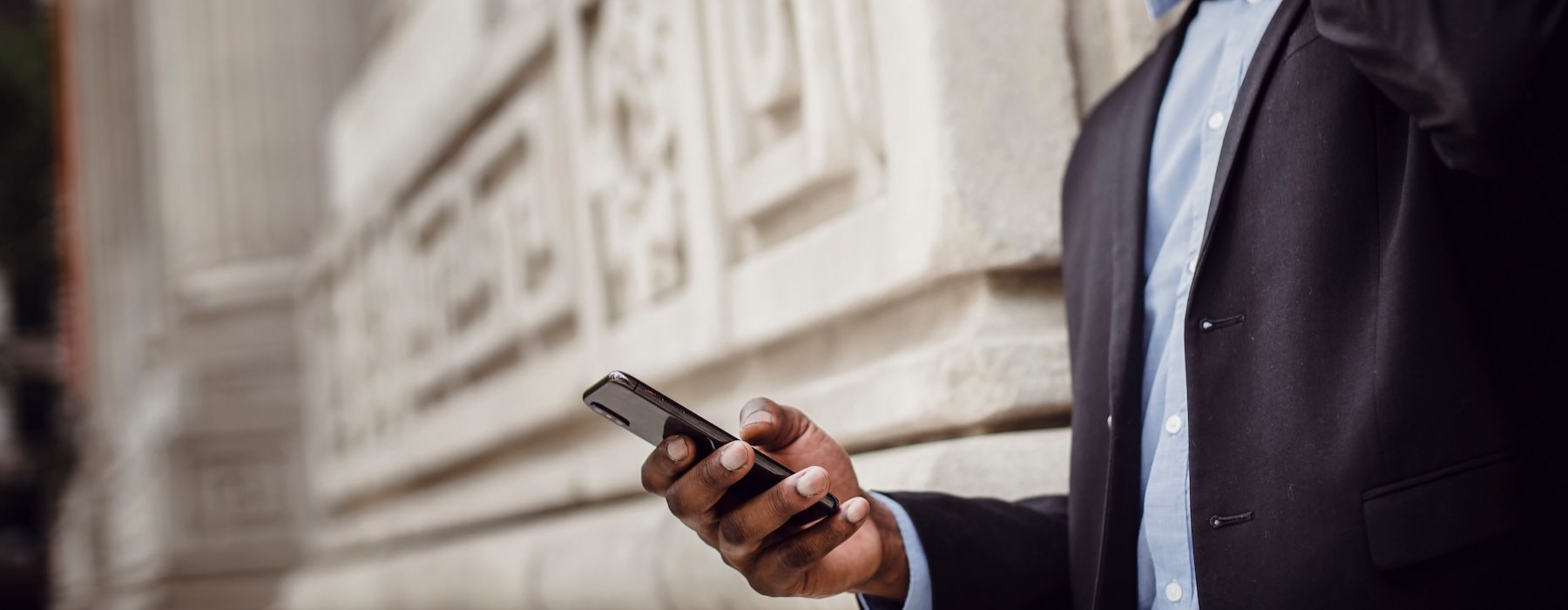 a man holding a phone