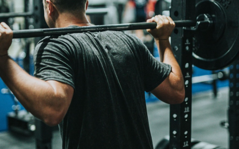 person lifting weights in a gym